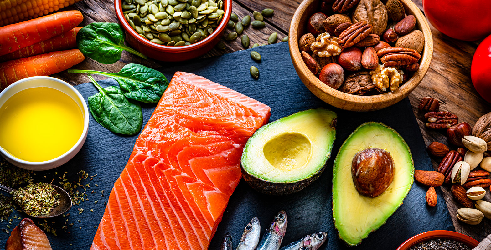 photo of healthy foods like avocados, salmon, oils, nuts