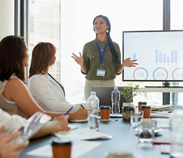 woman presenting data in a meeting