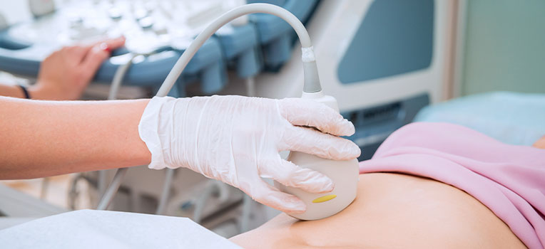 photo of abdominal ultrasound being performed