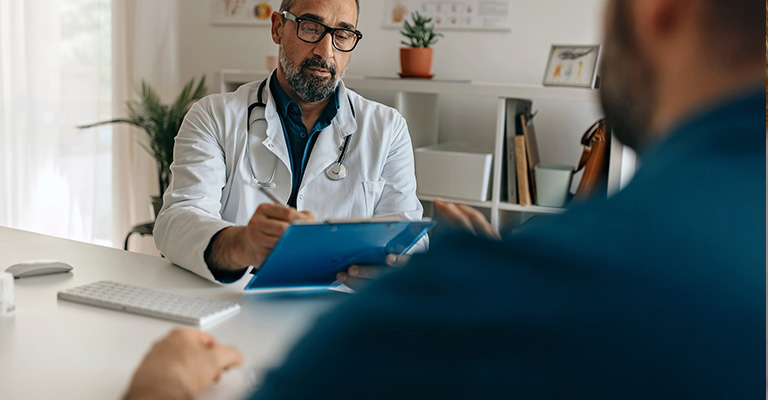 male doctor talking with patient