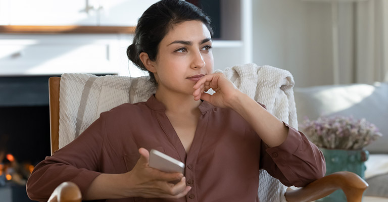 seated woman contemplating