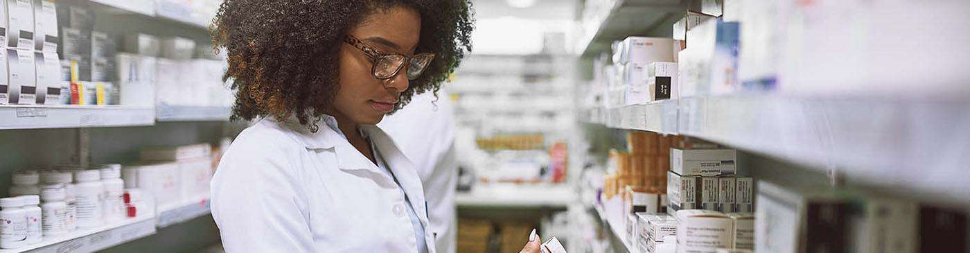 pharmacist reviewing medicine