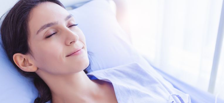 content woman lying down