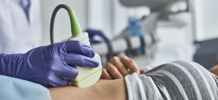 tech performing ultrasound
