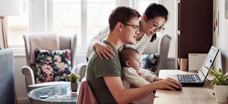 happy family reviewing their Progyny member guide online