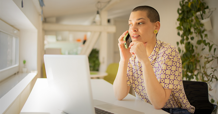 seated member on the phone