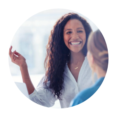 happy woman chatting with colleague