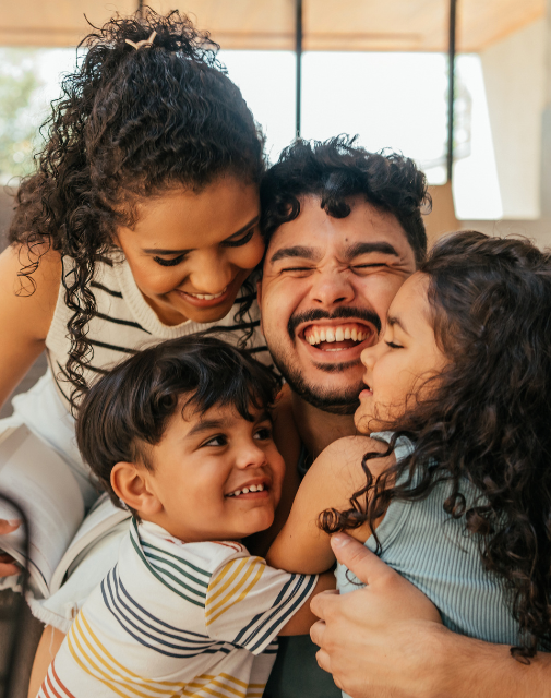 happy family hugging